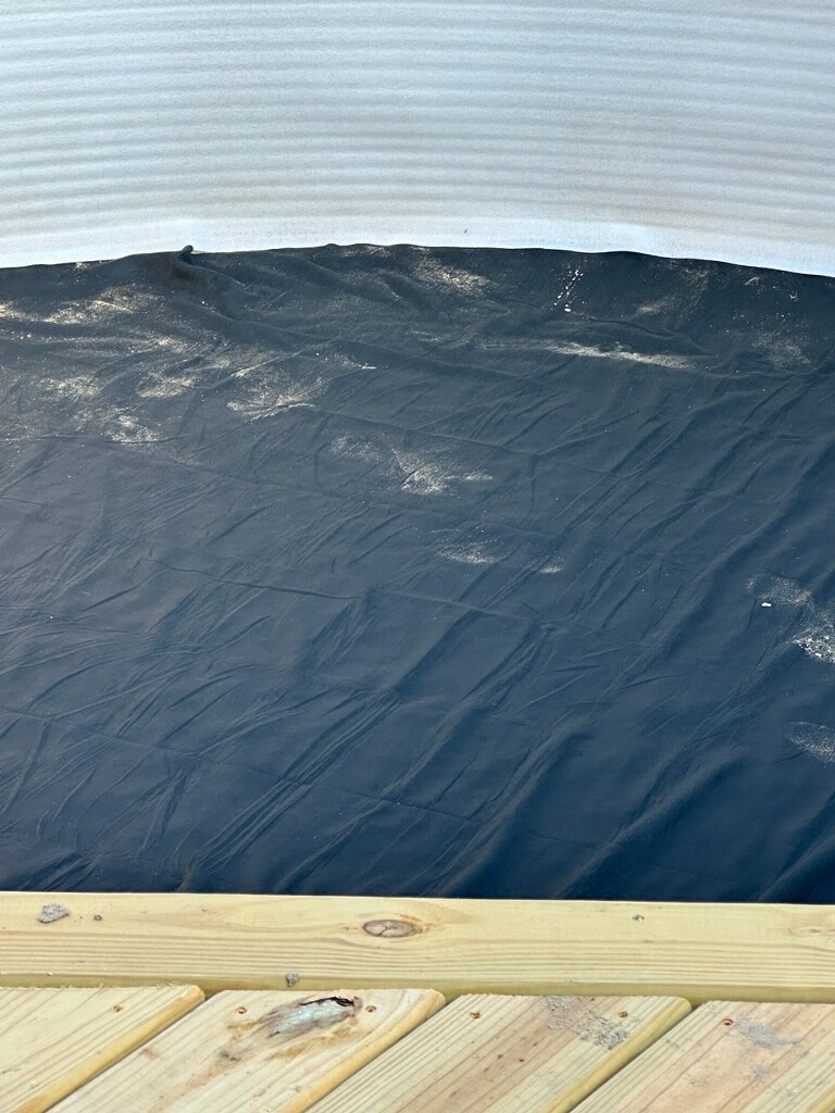Pool with new vinyl liner installed and refreshed deck