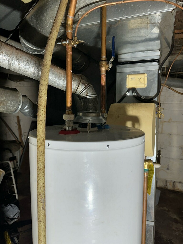 New water heater installed with fresh copper supply lines